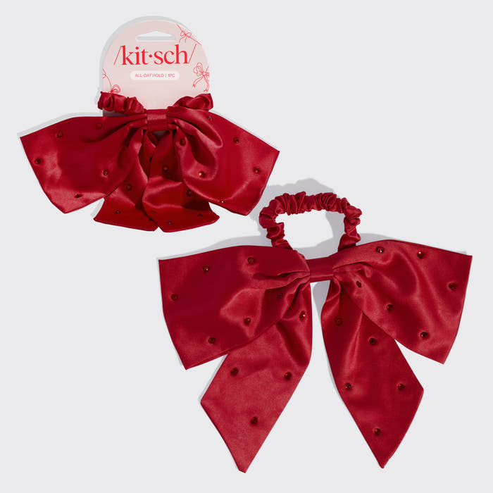 KITSCH Satin & Rhinestone Bow Scrunchie — hero product shot — sparkling rhinestone bow adds festive glamour to any hairstyle — silky red satin is gentle on all hair types
