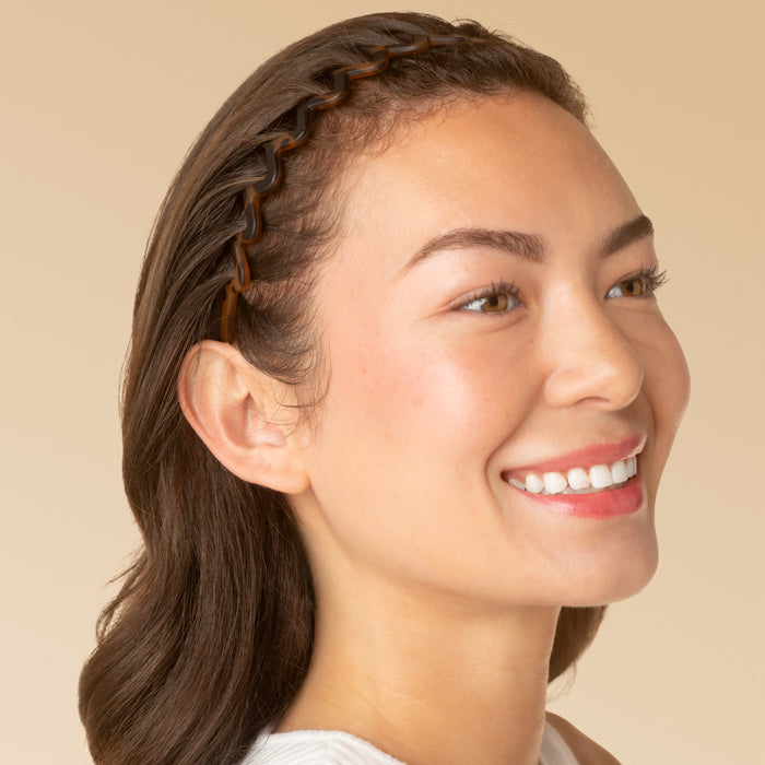 KITSCH Zig Zag Headband 2pc- Black & Tort — model wearing black zig zag headband for a slicked-back look — long, wavy teeth for a comfortable non-slip grip and stylish way to create slicked-back looks with ease — crafted with recycled plastic, gentle to the environment