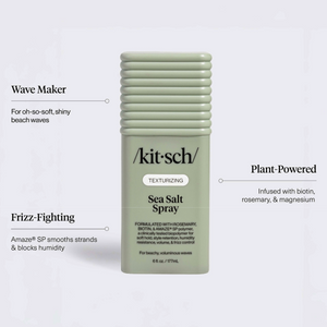 A bottle of kitsch Sea Salt Spray Texturizing in a sage green color, surrounded by four callout lines with text describing its features: Wave Maker, Frizz-Fighting, Plant-Powered, and the texturizing effect.