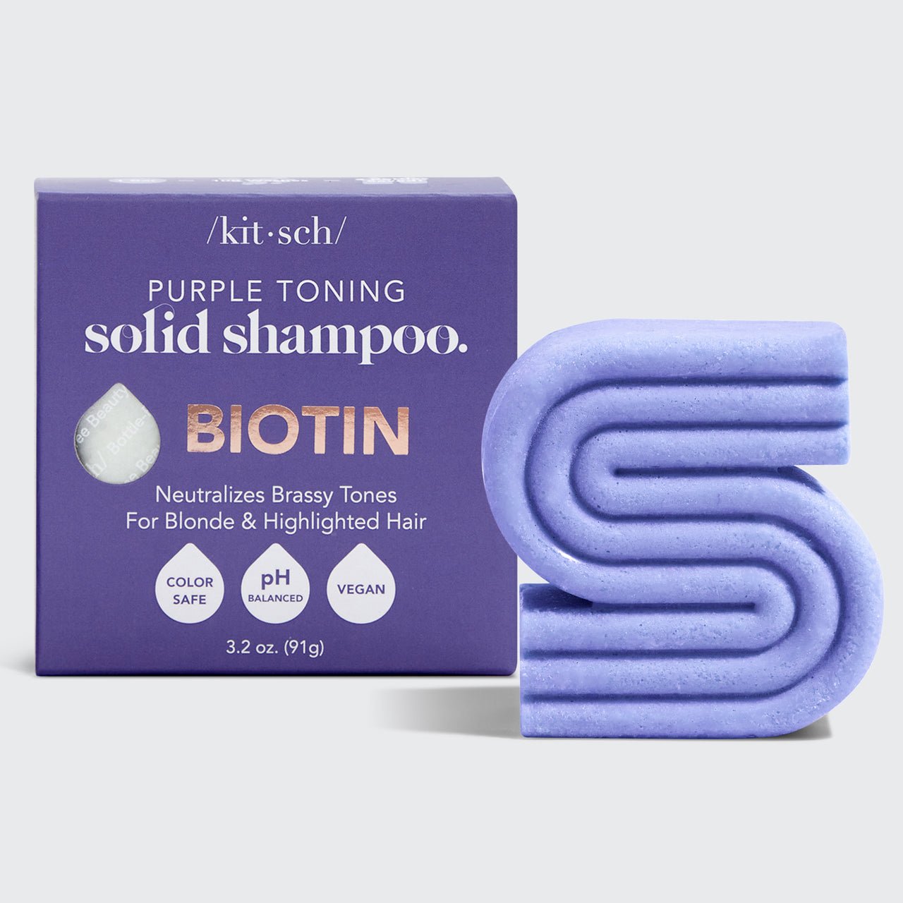 Barretta di shampoo e balsamo viola con pacchetto di contenitori per la biotina