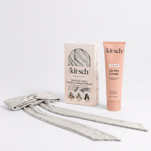 Kitsch Air Dry Cream and gray Set & Flow Active Heatless Curling Headband arranged with packaging.