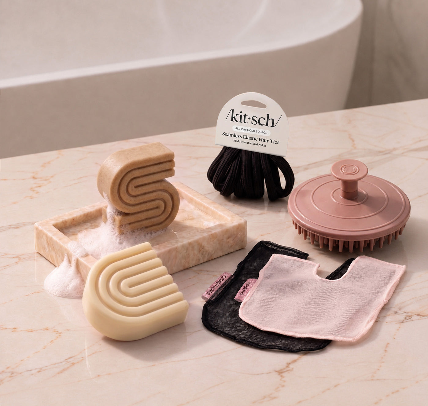 Coconut Oil: Kitsch Free Welcome Kit with Coconut Oil shampoo and conditioner bars, Terracotta Scalp Exfoliator, Blush Shampoo Bar Bag, Black Conditioner Bar Bag, and Black Seamless Hair Elastics.