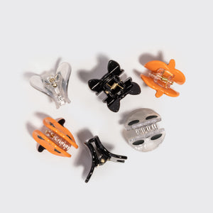 Back view of the Halloween Mini Claw Clips 6pc Set showing the clip mechanisms and Halloween-themed designs.