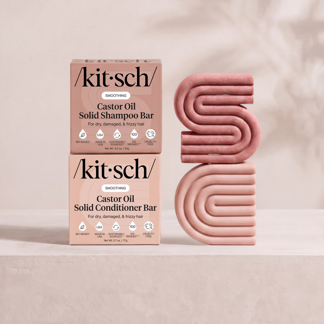 Kitsch Nourishing Castor Oil Solid Shampoo and Conditioner Bars shown side by side with retail packaging – for dry, damaged and frizzy hair